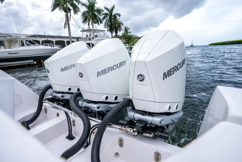 Slide: The Image of Triple Mercury outboard engines on a 2022 Intrepid 375 Nomad FE boat. - 36
