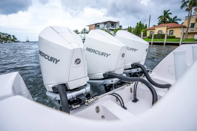 Slide: The Image of 2022 Intrepid 375 Nomad FE with triple Mercury outboard engines. - 37