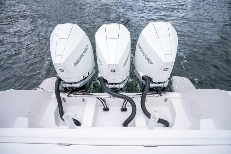 Slide: The Image of 2022 Intrepid 375 Nomad FE with triple Mercury outboard engines. - 38