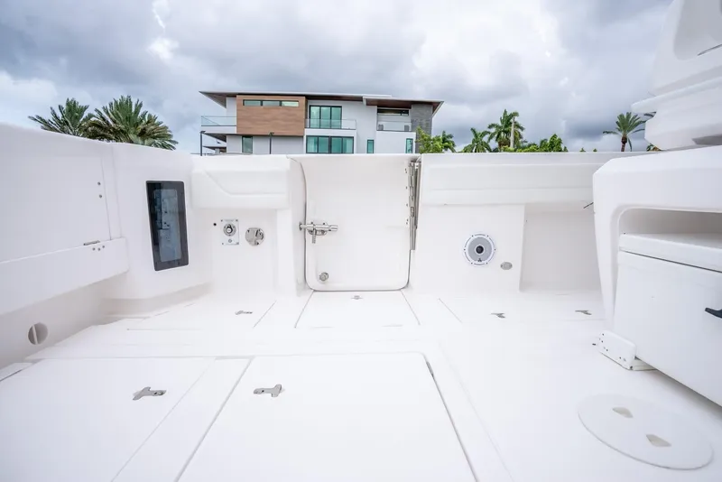 Slide: The Image of 2022 Intrepid 375 Nomad FE boat deck with modern amenities. - 39