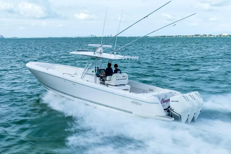 Slide: The Image of 2022 Intrepid 375 Nomad FE cruising on open water. - 5
