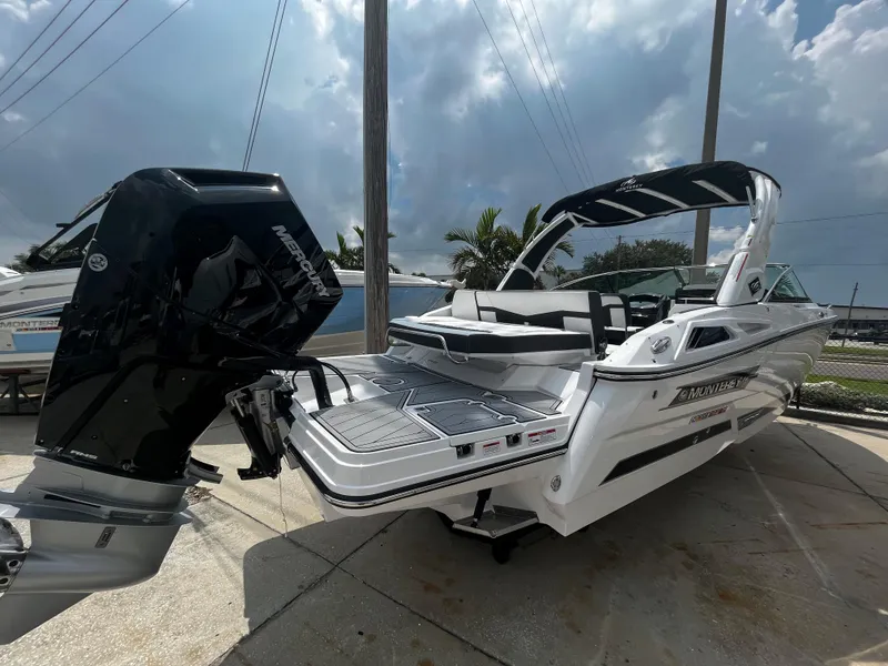 Slide: The Image of 2024 Monterey 275 Super Sport boat with powerful outboard motor. - 2