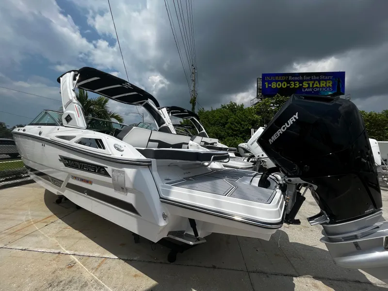 Slide: The Image of 2024 Monterey 275 Super Sport boat with Mercury engine on display. - 3