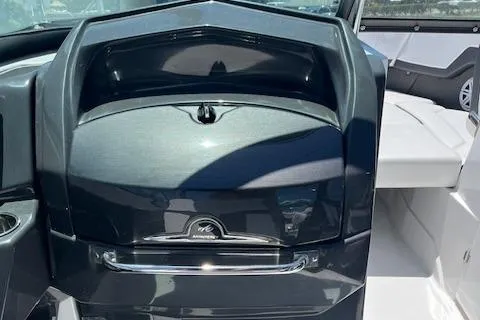 Slide: The Image of 2024 Monterey 275 Super Sport dashboard and storage compartment. - 36