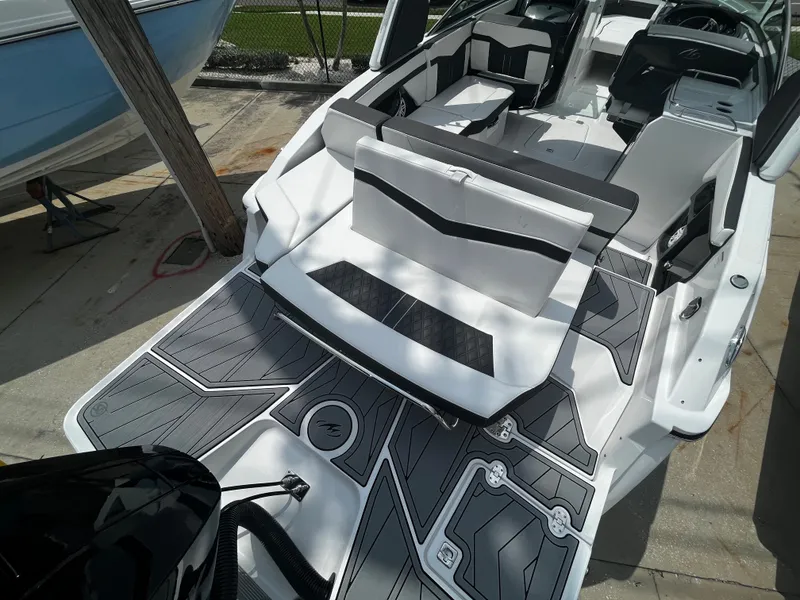 Slide: The Image of 2024 Monterey 275 Super Sport boat with sleek interior and spacious seating. - 7