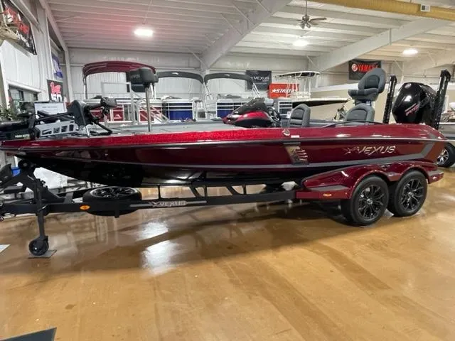 The Image of 2023 Vexus VX20 bass boat in showroom, red color, on trailer. - 1