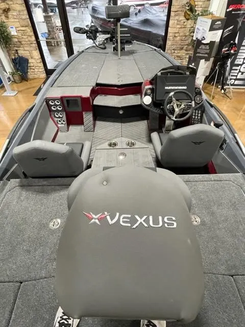 Slide: The Image of 2023 Vexus VX20 boat interior with advanced navigation system and seating. - 6