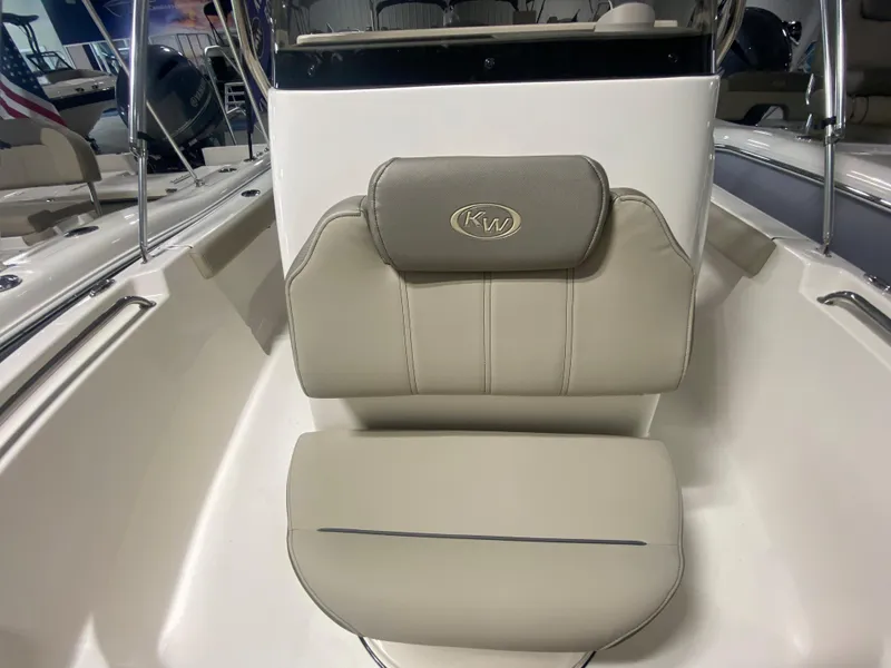 Slide: The Image of 2024 Key West 189 FS boat with beige cushioned seating. - 19