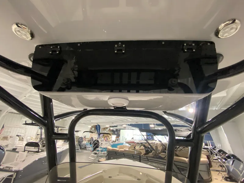 Slide: The Image of 2024 Key West 244 CC center console boat interior view in showroom. - 17