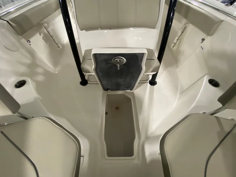 Slide: The Image of 2024 Key West 244 CC boat interior with seating and storage compartments. - 20