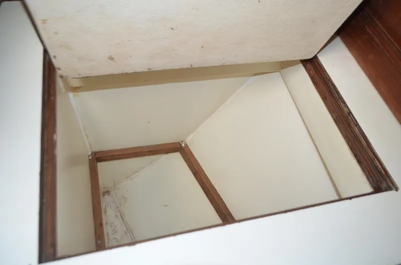 Slide: The Image of Open storage compartment on 1973 Skookum Ketch boat, showcasing interior space. - 18