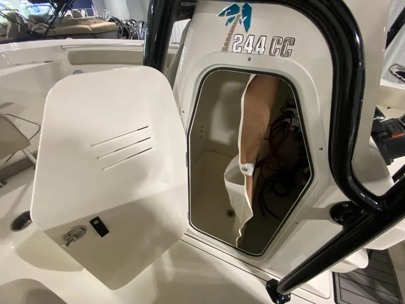 Slide: The Image of 2024 Key West 244 CC boat interior storage compartment. - 21