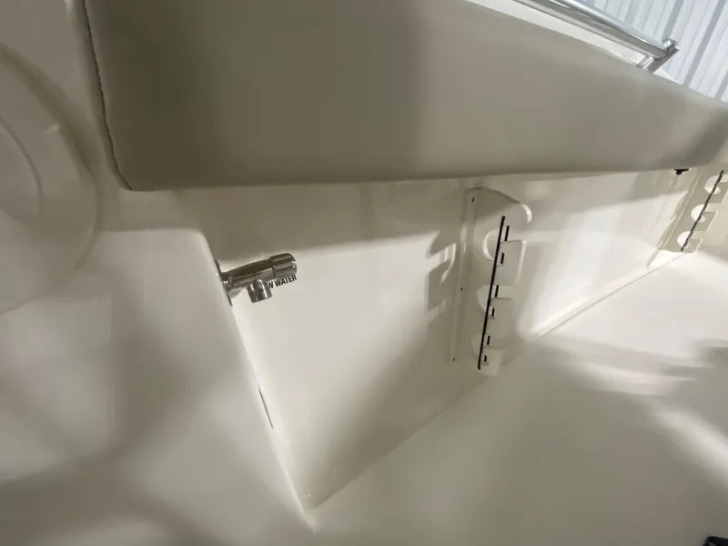 Slide: The Image of Interior detail of 2024 Key West 244 CC boat showing storage compartment. - 28