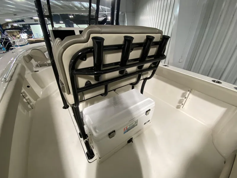 Slide: The Image of 2024 Key West 244 CC boat interior with seating and storage. - 11