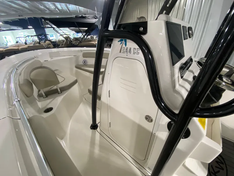 Slide: The Image of 2024 Key West 244 CC center console boat interior with seating and helm. - 18