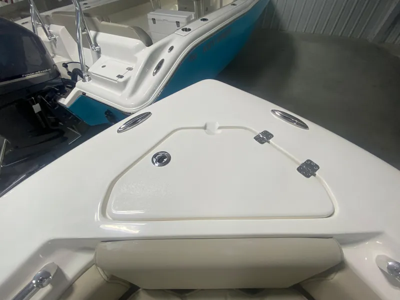 Slide: The Image of 2024 Key West 219 FS boat bow with storage compartment. - 20