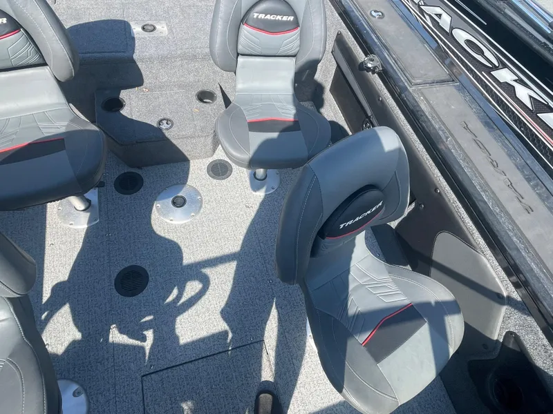 Slide: The Image of 2021 Tracker Targa V-19 WT boat interior with seating and deck. - 5