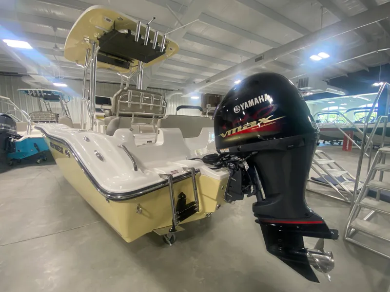 Slide: The Image of 2024 Key West 219 FS boat with Yamaha outboard motor in showroom. - 3