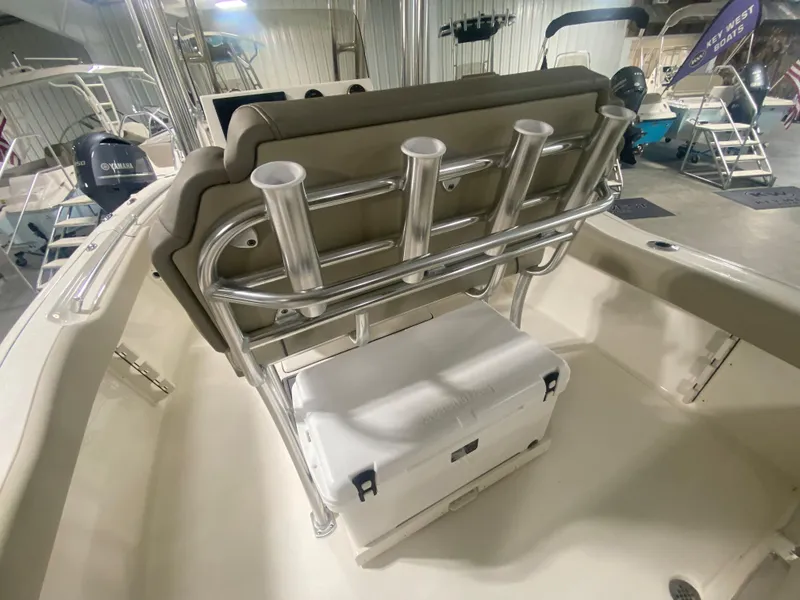Slide: The Image of 2024 Key West 219 FS boat interior with rod holders and cooler. - 8
