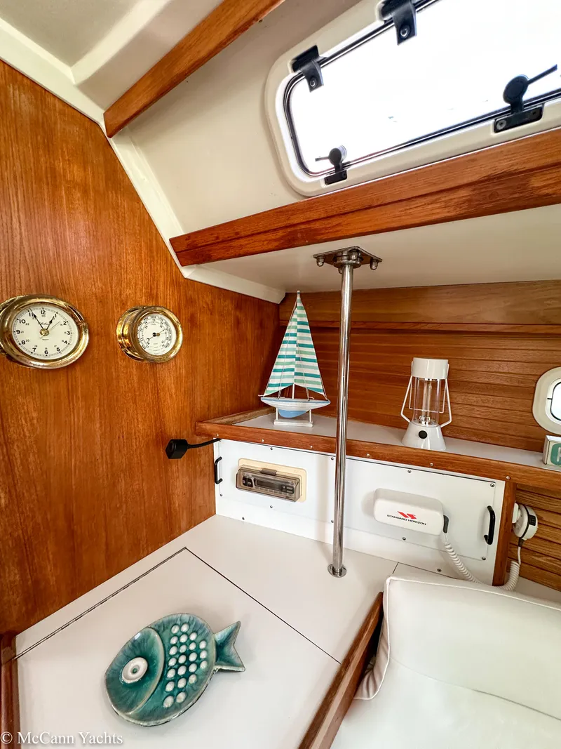 Slide: The Image of Interior of a 1991 Catalina 42 yacht with nautical decor and wooden accents. - 41
