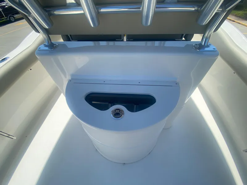 Slide: The Image of 2024 Key West 239 FS boat interior, featuring a sleek white console and seating area. - 10