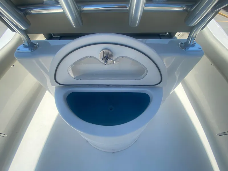 Slide: The Image of 2024 Key West 239 FS boat console with sink and storage compartment. - 11