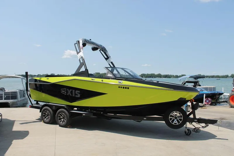 The Image of 2024 Axis T220 boat on trailer at marina. - 1