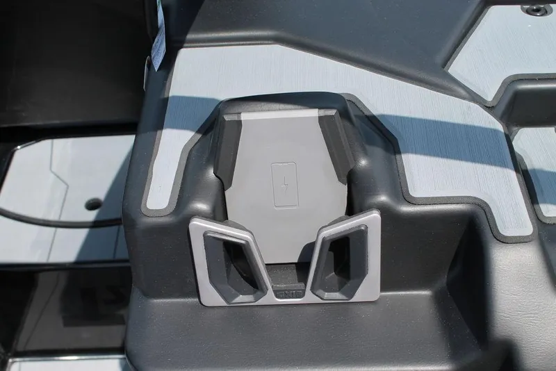 Slide: The Image of 2024 Axis T220 boat interior with integrated phone holder. - 11