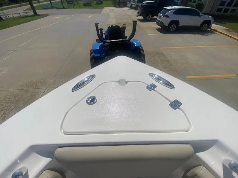 Slide: The Image of 2024 Key West 239 FS boat on trailer in parking lot. - 26