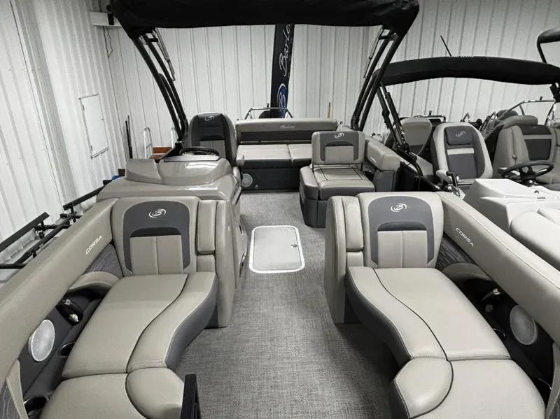 Slide: The Image of 2024 Barletta Corsa 23U pontoon boat interior with luxurious seating and modern design. - 2