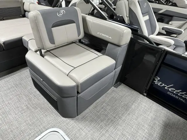 Slide: The Image of 2024 Barletta Corsa 23U boat interior with gray seating and logo detailing. - 7