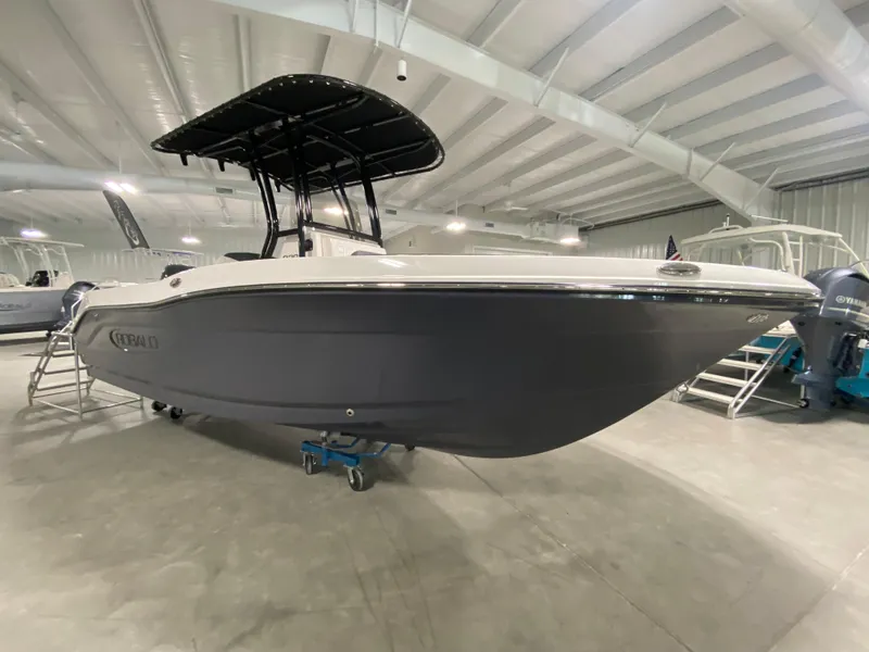 Slide: The Image of 2024 Robalo 202 EXPLORER boat in showroom, side view. - 1