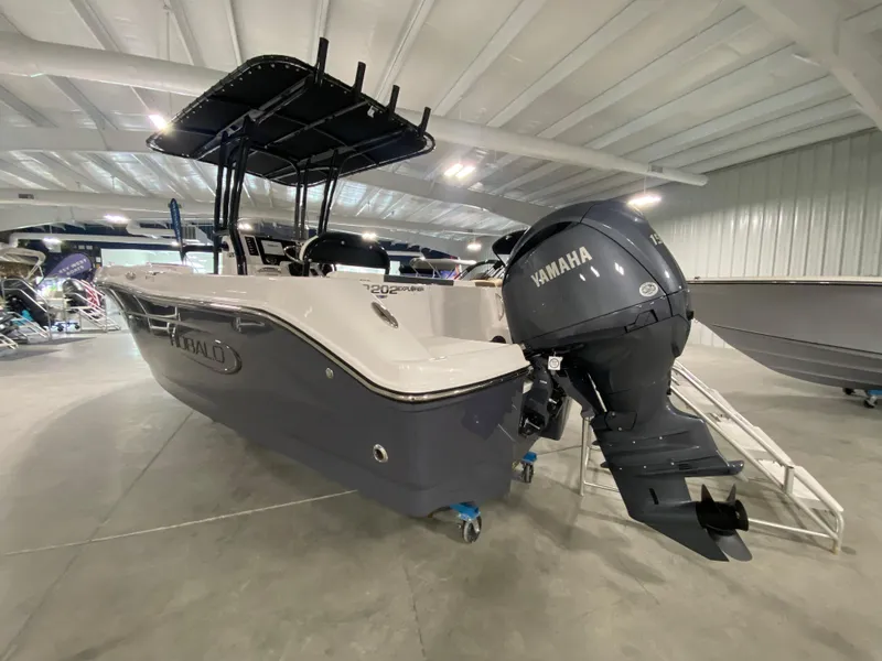 Slide: The Image of 2024 Robalo 202 EXPLORER boat with Yamaha outboard motor in showroom. - 4