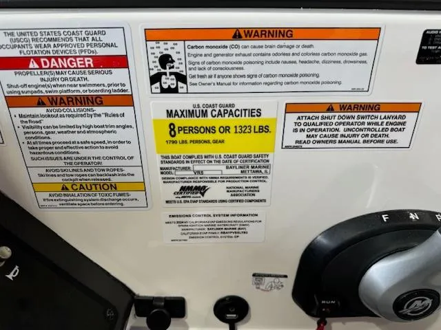 Slide: The Image of 2024 Bayliner VR5 boat safety and capacity labels, maximum 8 persons or 1323 lbs. - 10