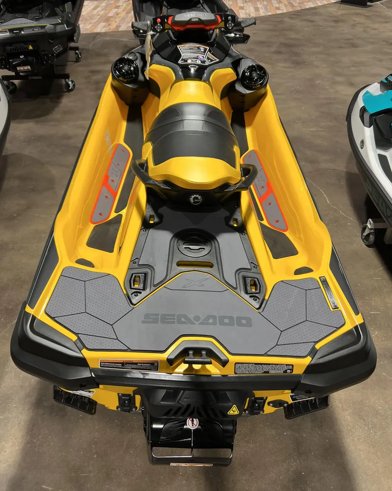 Slide: The Image of 2023 Sea-Doo RXT X 300 jet ski in yellow and black. - 5