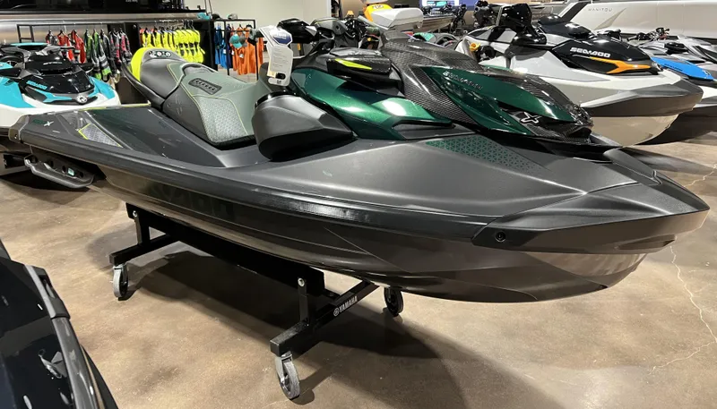 Slide: The Image of 2023 Sea-Doo RXP CARBON 300 jet ski on display in showroom. - 2