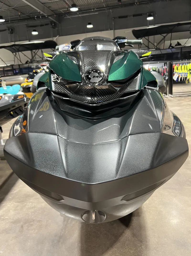 Slide: The Image of 2023 Sea-Doo RXP CARBON 300 jet ski in showroom. - 3