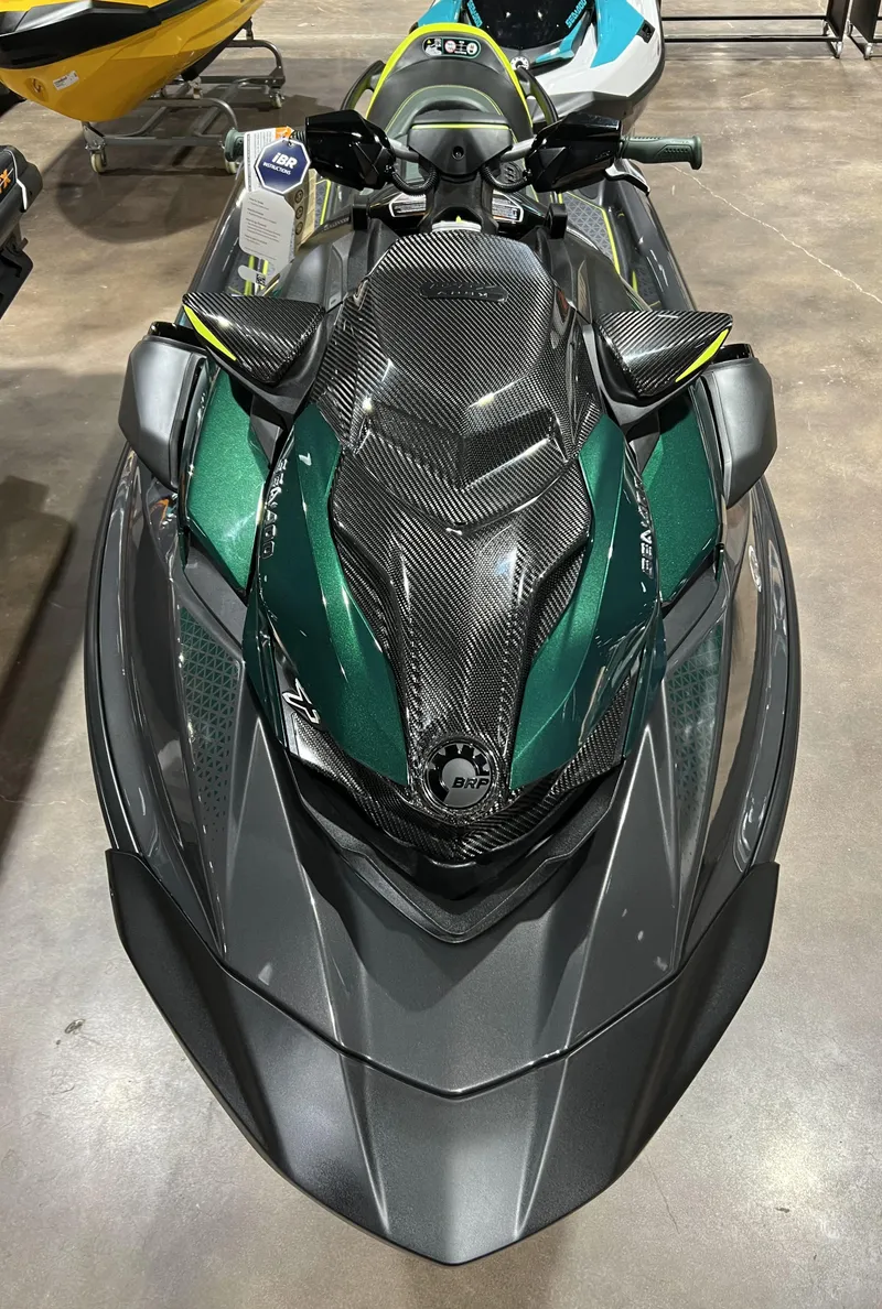 Slide: The Image of 2023 Sea-Doo RXP CARBON 300 jet ski in showroom. - 4