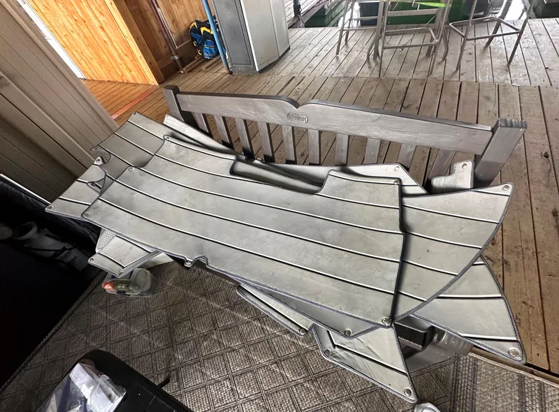 Slide: The Image of Boat deck mats for 2022 Tahoe 2150 CC on wooden dock. - 32
