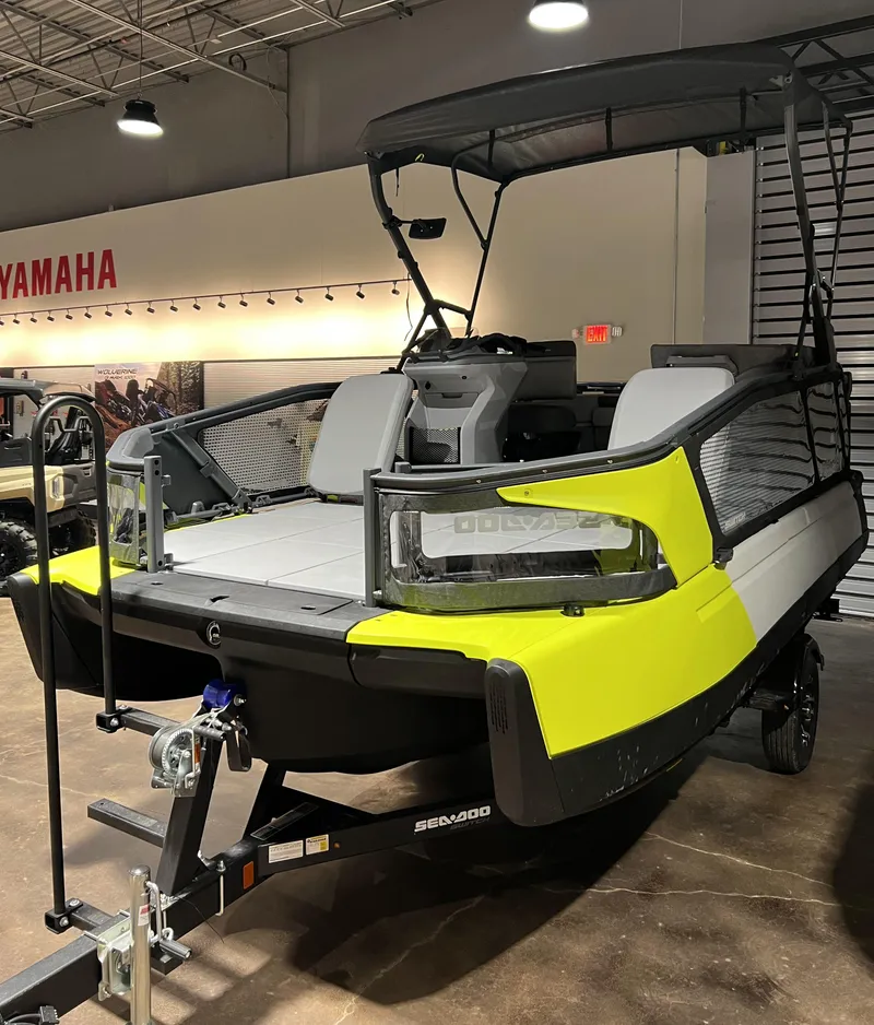 Slide: The Image of 2023 Sea-Doo SWITCH SPORT 18 230 boat on display in showroom. - 2