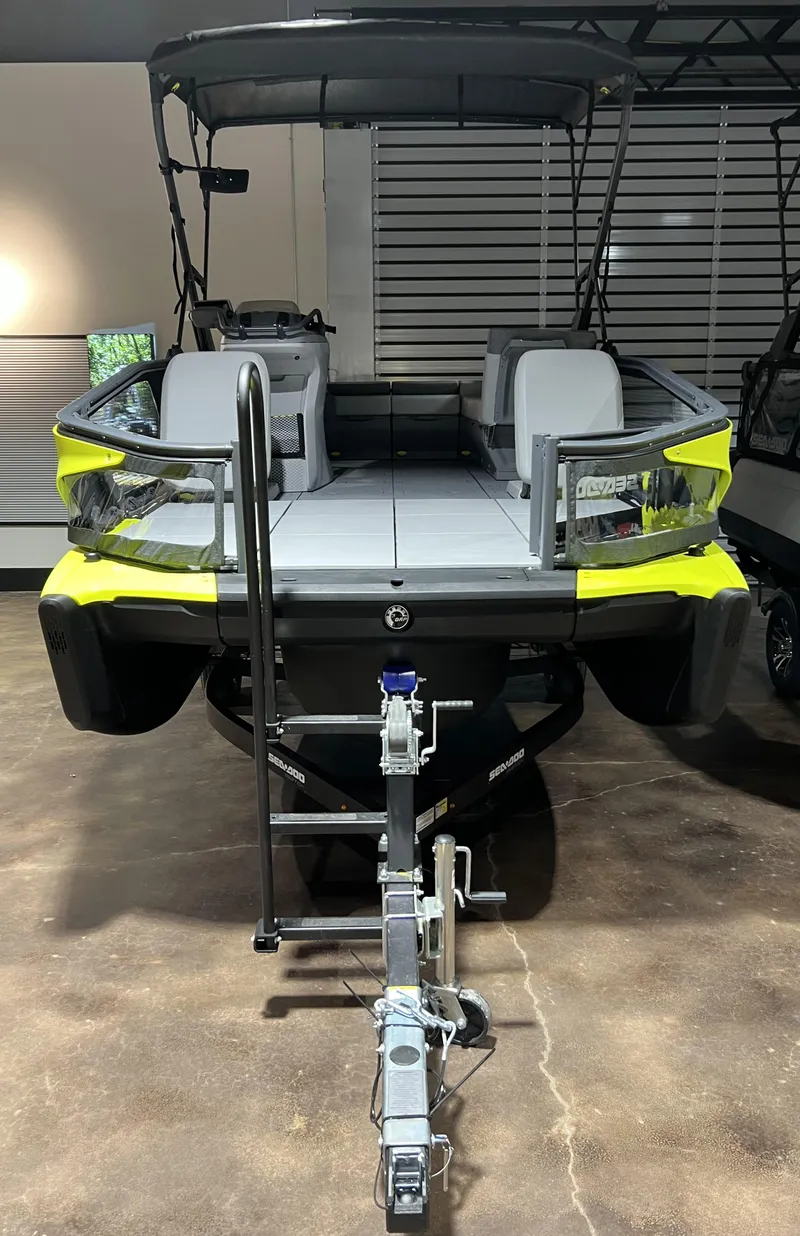 Slide: The Image of 2023 Sea-Doo SWITCH SPORT 18 230 boat on trailer in showroom. - 3