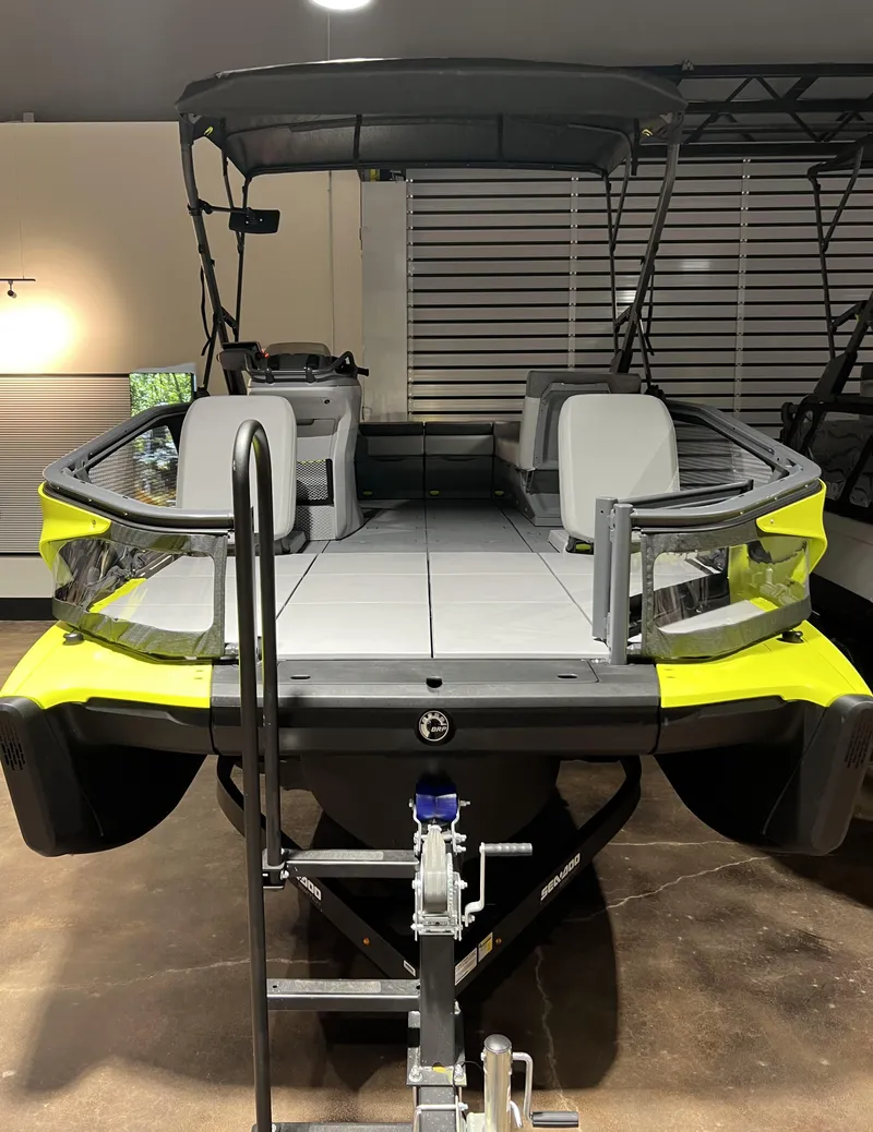 Slide: The Image of 2023 Sea-Doo SWITCH SPORT 18 230 pontoon boat in showroom. - 4