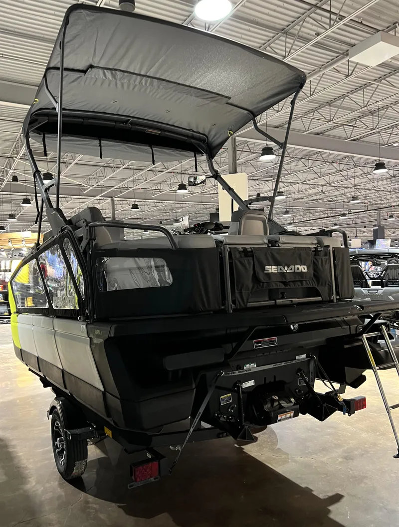 Slide: The Image of 2023 Sea-Doo SWITCH SPORT 18 230 boat displayed indoors. - 6