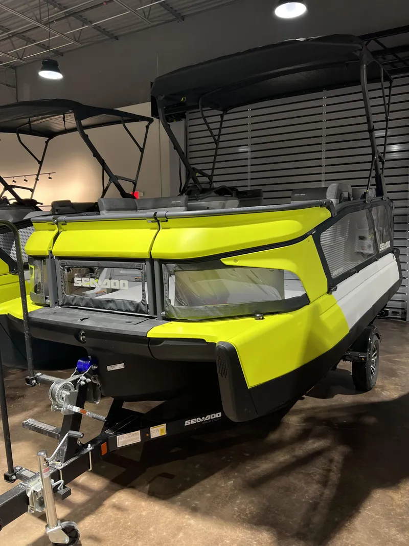 Slide: The Image of 2023 Sea-Doo SWITCH CRUISE 18-130HP in showroom, front view. - 3