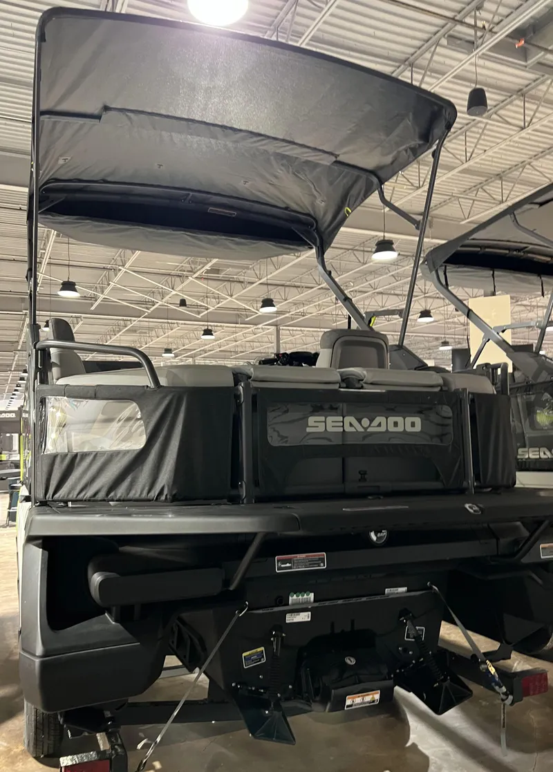 Slide: The Image of 2023 Sea-Doo SWITCH CRUISE 18-130HP pontoon boat in showroom. - 6