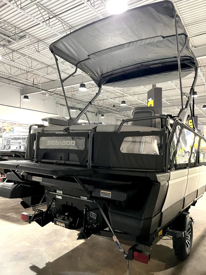 Slide: The Image of 2023 Sea-Doo SWITCH CRUISE 18-130HP pontoon boat in showroom. - 7