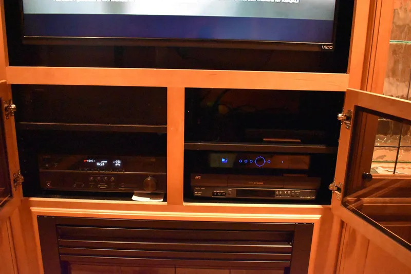 Slide: The Image of Entertainment system in 2006 Sumerset Double Dippin houseboat with TV and audio equipment. - 21