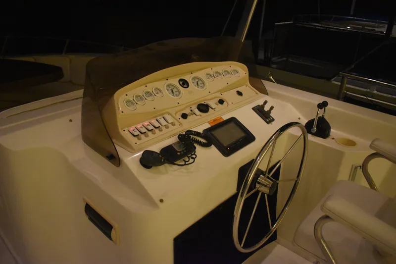 Slide: The Image of Control panel of a 2006 Sumerset Double Dippin houseboat at night. - 22