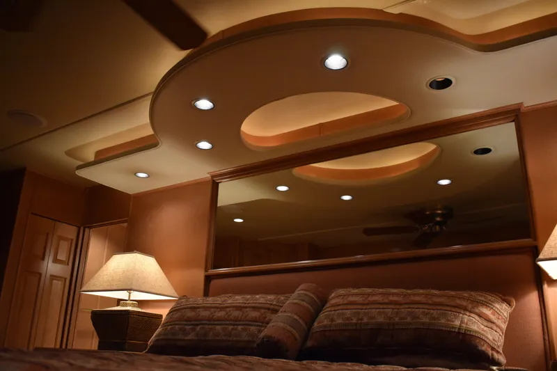 Slide: The Image of Luxurious bedroom interior of 2006 Sumerset Double Dippin houseboat with modern lighting. - 27
