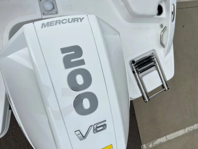 Slide: The Image of Mercury 200 V6 engine on 2024 Tahoe 210 S boat, rear view. - 13